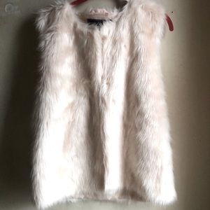 Cream colored faux fur vest